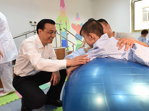 這三年，總理牽掛的殘疾人群體，迎來哪些暖政？