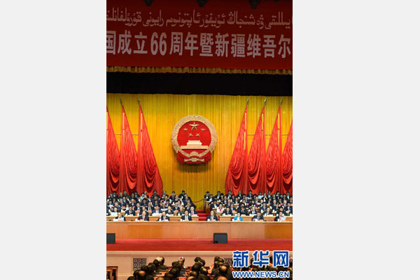 10月1日，慶祝中華人民共和國(guó)成立66周年暨新疆維吾爾自治區(qū)成立60周年大會(huì)在新疆人民會(huì)堂隆重舉行。 新華社記者 高潔 攝 