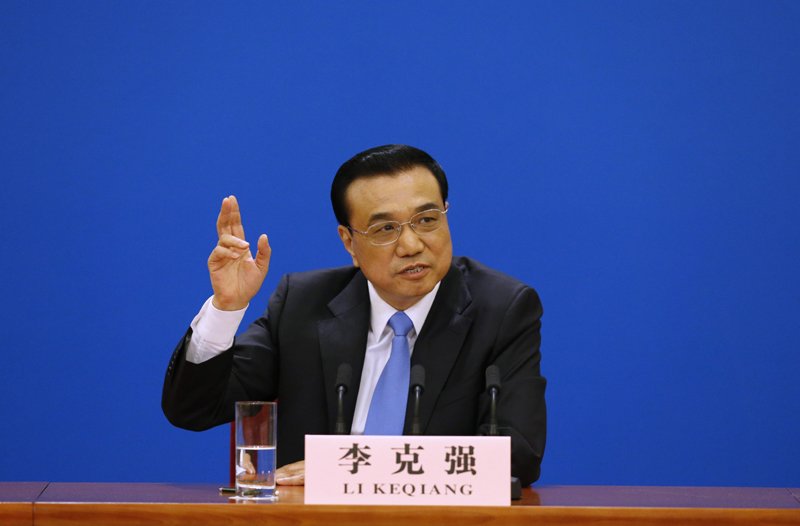 3月15日，國務院總理李克強在北京人民大會堂與中外記者見面，并回答記者提問。 新華社記者 沈伯韓 攝