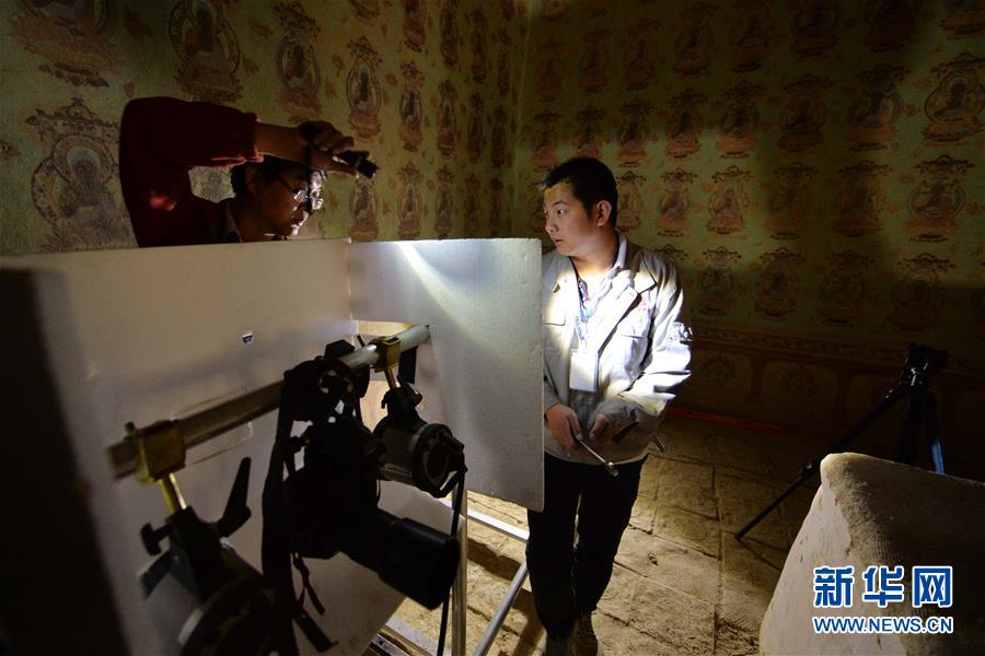 （時代先鋒&middot;圖文互動）（16）此生不悔入沙海 勇?lián)厝问家娊?mdash;&mdash;敦煌研究院文物保護利用群體群像