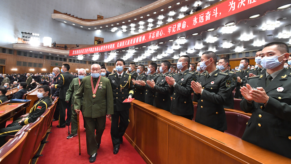 大會(huì)前，志愿軍老同志入場(chǎng)