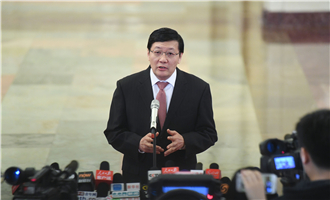 全國社?；鹄硎聲硎麻L樓繼偉接受采訪