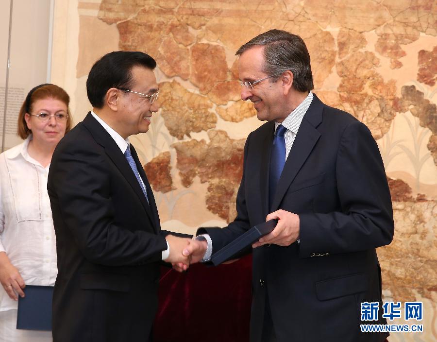 6月21日，國務(wù)院總理李克強與希臘總理薩馬拉斯共同出席希臘伊拉克利翁博物館新館開館儀式并發(fā)表講話。 新華社記者 龐興雷 攝