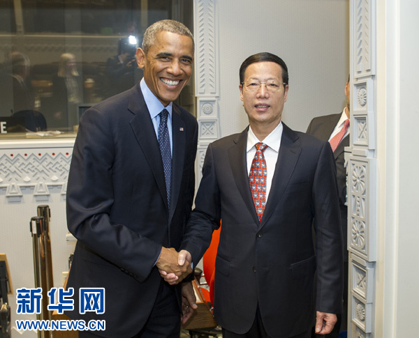 9月23日，國(guó)家主席習(xí)近平特使、國(guó)務(wù)院副總理張高麗在紐約會(huì)見出席聯(lián)合國(guó)氣候峰會(huì)的美國(guó)總統(tǒng)奧巴馬。 新華社記者王曄攝