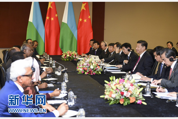 12月3日，國(guó)家主席習(xí)近平在約翰內(nèi)斯堡會(huì)見(jiàn)吉布提總統(tǒng)蓋萊。新華社記者 謝環(huán)馳 攝 

