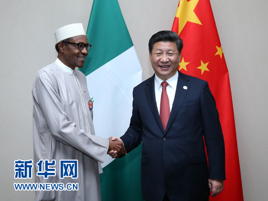 12月4日，國家主席習近平在約翰內(nèi)斯堡會見尼日利亞總統(tǒng)布哈里。 新華社記者 龐興雷 攝 