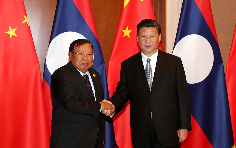 習(xí)近平同老撾人民革命黨中央總書記、國家主席本揚(yáng)舉行會(huì)談